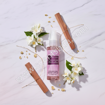 A Thousand Wishes 1 fl oz Hand Sanitizer on white marble with jasmine flowers and gold accents