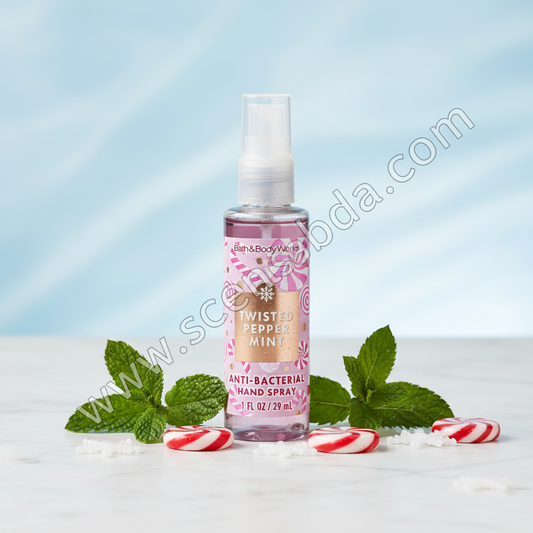 Twisted Peppermint 1 fl oz Hand Sanitizer on white marble with spearmint and snowflakes