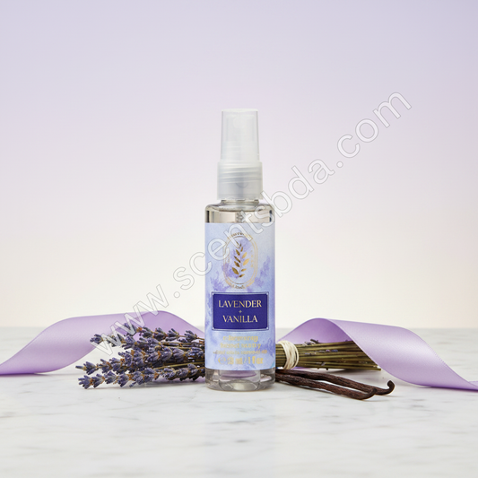 Lavender Vanilla 1 fl oz Hand Sanitizer on white marble with lavender bundles and vanilla pods