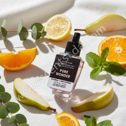 Pure Wonder Wallflower Refill with fresh pears, citrus fruits and green leaves
