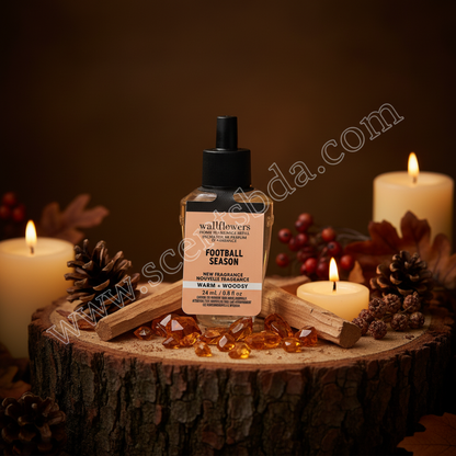 Football Season Wallflower Refill on dark wood with cedarwood pieces, amber crystals and glowing candles